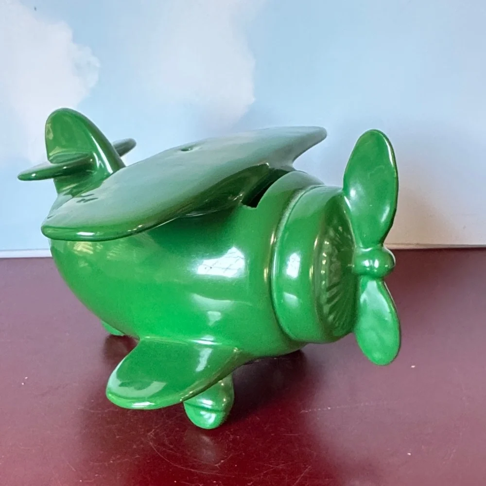 Vintage Green piggy bank Airplane